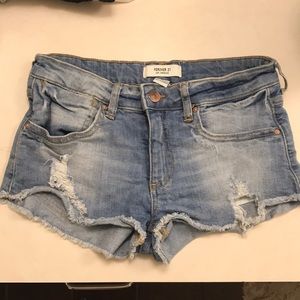 Distressed light wash jean shorts